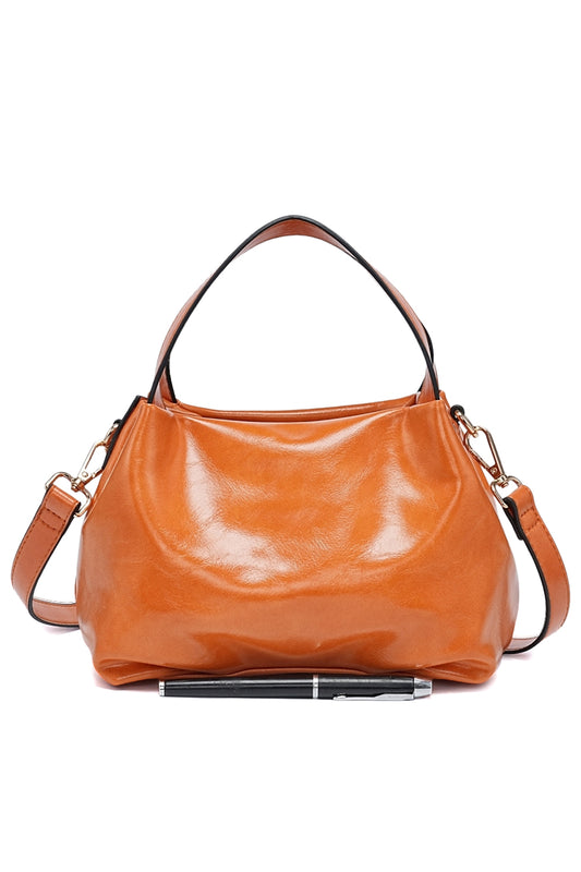 Versatile Handbag and Crossbody with Sleek, Shiny Zippered Design